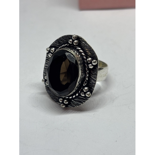 639 - A MARKED 925 SILVER RING WITH BROWN STONE IN A PRESENTATION BOX