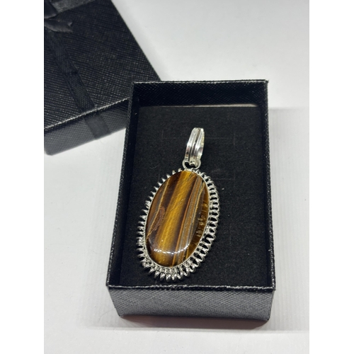 643 - A MARKED 925 SILVER TIGER EYE PENDANT IN A PRESENTATION BOX