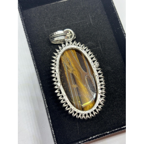 643 - A MARKED 925 SILVER TIGER EYE PENDANT IN A PRESENTATION BOX