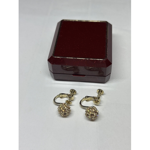 648 - A PAIR OF CRYSTAL BALL SCREW BACK EARRINGS IN A PRESENTATION BOX