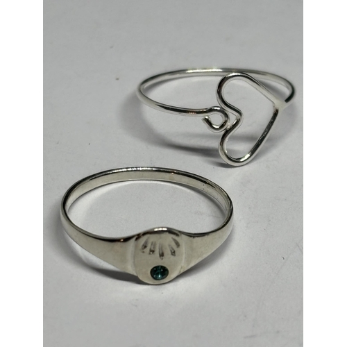 693 - FOUR HALLMARKED SILVER RINGS