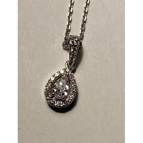 740 - AN 18 CARAT WHITE GOLD PENDANT WITH CHAIN STUDDED WITH PAIR AND ROUND CUT DIAMONDS 0.43 CARATS GROSS... 