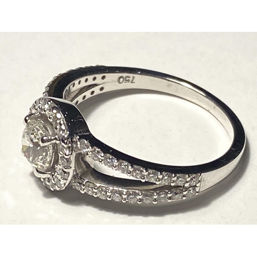 743 - AN 18 CARAT WHITE GOLD RING STUDDED WITH ROUND BRILLIANT CUT NATURAL DIAMONDS. DIANOND WEIGHT 0.46 &... 