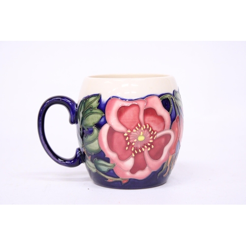 753 - A MOORCROFT MUG WILD ROSE PATTERN