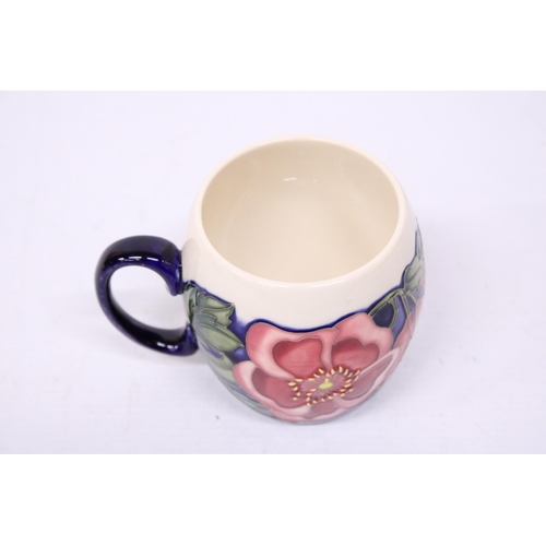 753 - A MOORCROFT MUG WILD ROSE PATTERN