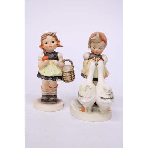 811 - TWO GOEBEL HUMMEL FIGURES 