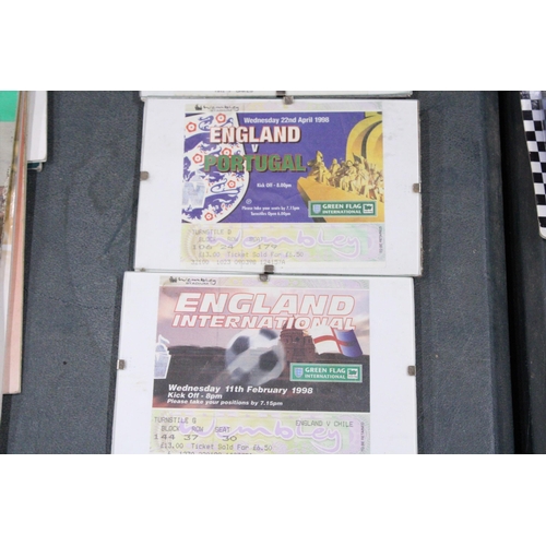 877 - FIVE FRAMED AND GLAZED VINTAGE ENGLAND WEMBLEY FOOTBALL TICKETS