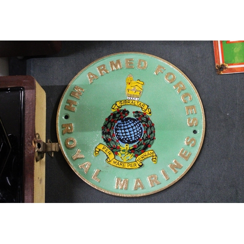 936 - A CAST ROYAL MARINES SIGN, DIAMETER 24CM