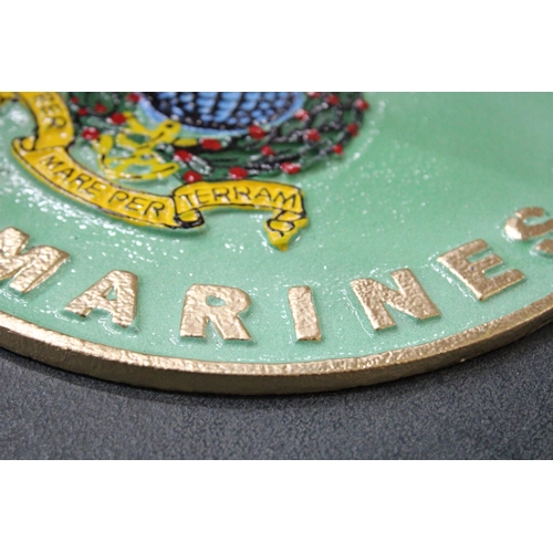 936 - A CAST ROYAL MARINES SIGN, DIAMETER 24CM