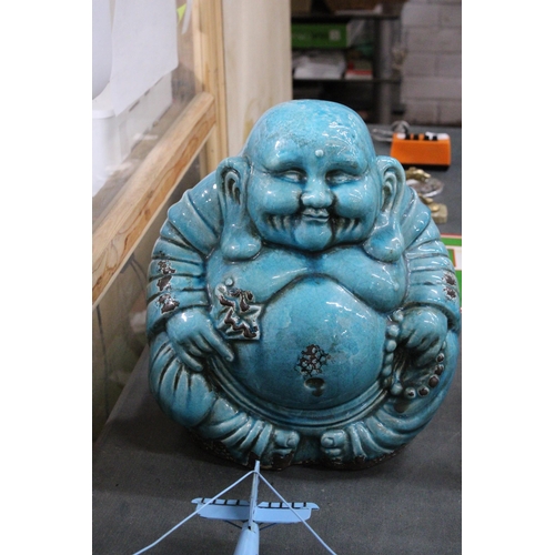 951 - A LARGE BLUE CERAMIC SITTING BUDDAH, HEIGHT APPROX 36CM