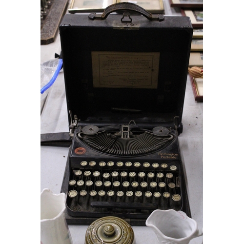 1013 - A VINTAGE REMINGTON WORLD SERVICE TYPEWRITER IN ORIGINAL CASE