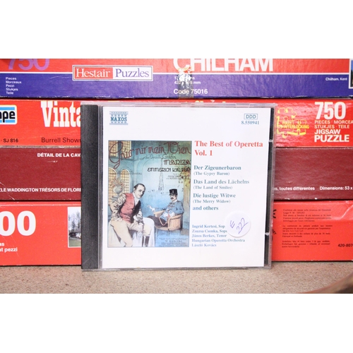 1125 - A QUANTITY OF VINTAGE JIGSAW PUZZLES AND CLASSICAL CDS