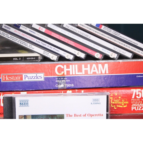 1125 - A QUANTITY OF VINTAGE JIGSAW PUZZLES AND CLASSICAL CDS