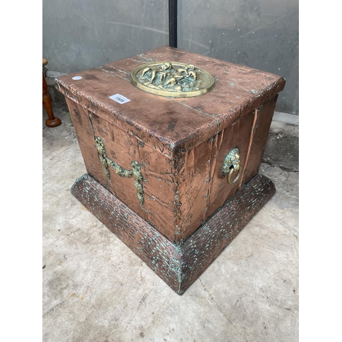 1509 - AN ARTS AND CRAFTS COPPER COVERED COAL BOX WITH LINER AND BRASS PLAQUE AND HANDLES