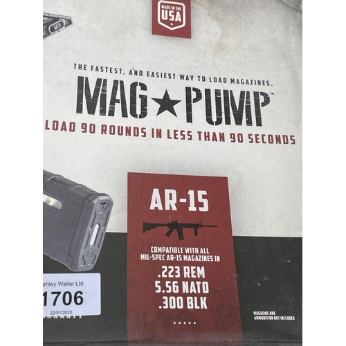 1706 - TWO BOXED MAG PUMPS AR-15