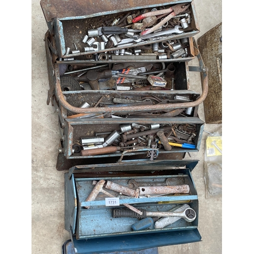 1731 - TWO METAL TOOL BOXES AND AN ASSORTMENT OF TOOLS TO INCLUDE SOCKETS, PLIERS AND HAMMER HEADS ETC