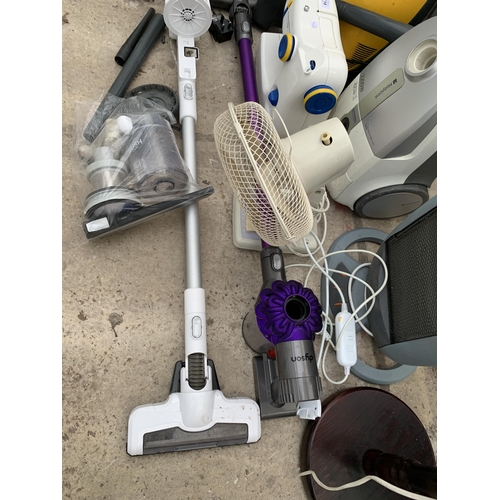 2418 - AN ASSORTMENT OF ITEMS TO INCLUDE A SEWING MACHINE, VACUUM CLEANERS AND A STANDARD LAMP ETC