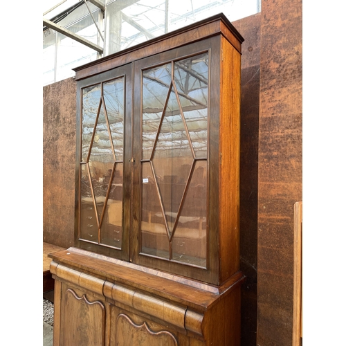 2504 - A VICTORIAN MAHOGANY TWO DOOR BOOKCASE ON BASE 48