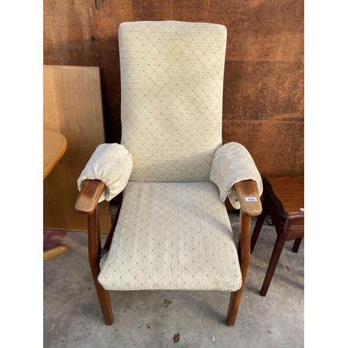 2528 - A PARKER KNOLL FIRESIDE CHAIR MODEL NO. PK.928-9