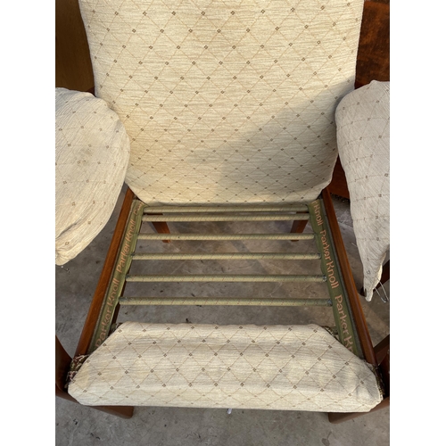 2528 - A PARKER KNOLL FIRESIDE CHAIR MODEL NO. PK.928-9