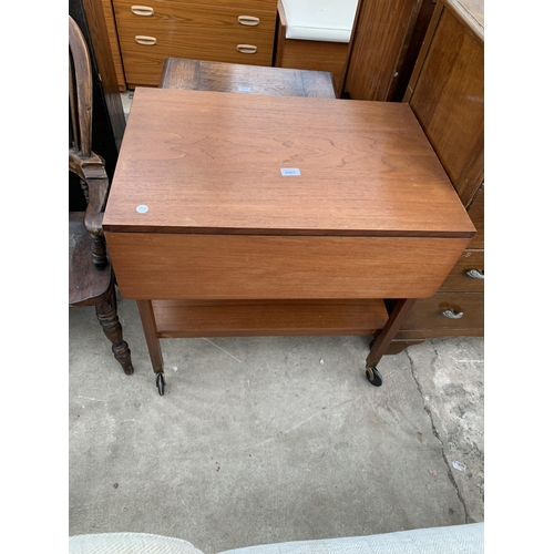 2667 - A RETRO TEAK TWO TIER DROP LEAF TROLLEY