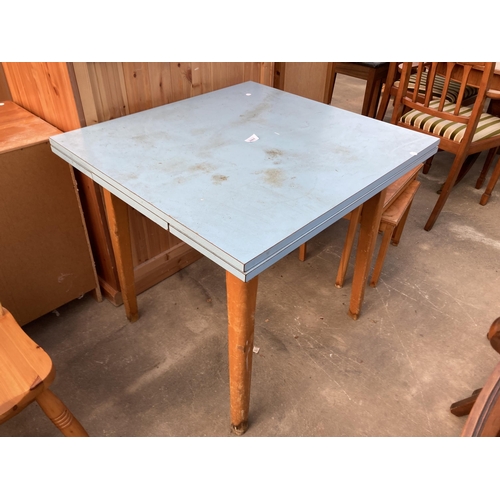 2801 - A 1950'S FORMICA TOP DRAW LEAF KITCHEN TABLE