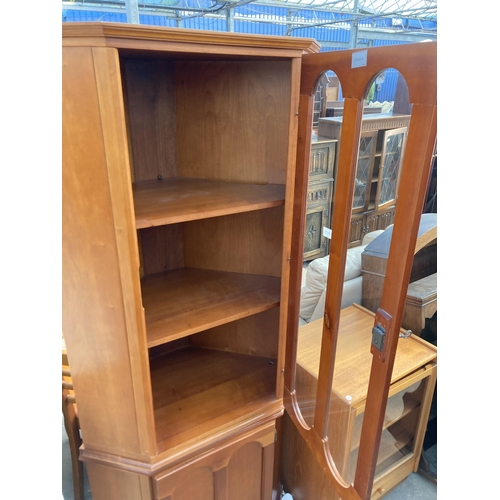 2822 - A RETRO TEAK CANALETTO BY DUCAL CORNER CUPBOARD WITH GLAZED UPPER PORTION 30