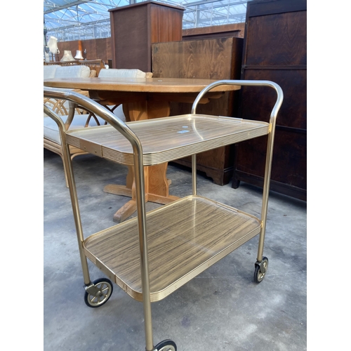 2830 - A 1970'S METALWARE TWO TIER TROLLEY