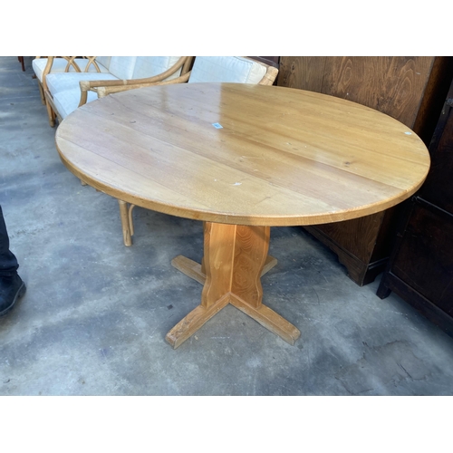 2831 - A SATINWOOD PEDESTAL DINING TABLE 42