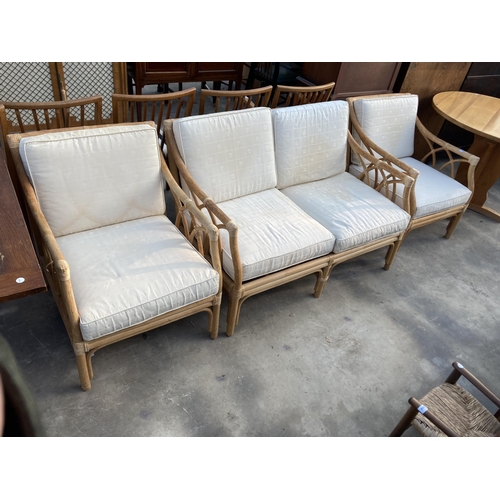 2832 - A BAMBOO AND WICKER THREE PIECE LOUNGE SUITE.