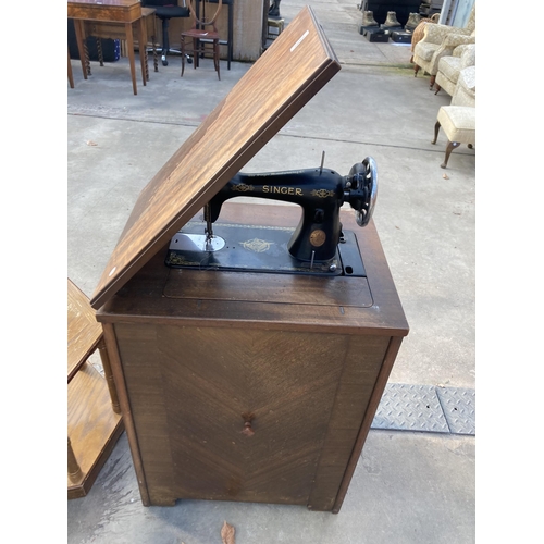 2852 - A SINGER TREADLE SEWING MACHINE IN CABINET, NUMBER Y8843968