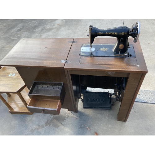 2852 - A SINGER TREADLE SEWING MACHINE IN CABINET, NUMBER Y8843968