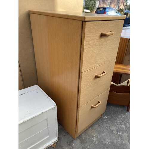 2891 - AN OAK EFFECT THREE DRAWER FILING CABINET AND YEW WOOD MAGAZINE RACK/TABLE