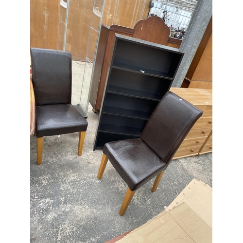 2964 - A BLACK ASH EFFECT BOOKCASE AND TWO FAUX LEATHER DINING CHAIRS