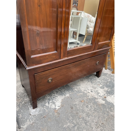 2967 - A LATE VICTORIAN MAHOGANY MIRROR-BACK WARDROBE WITH DRAWER TO BASE, 47