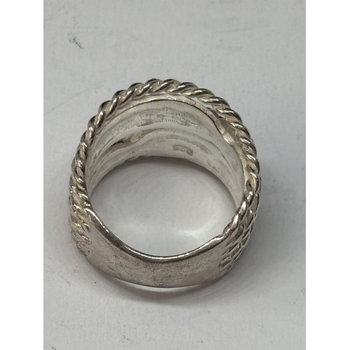 522 - A LADIES MARKED SILVER DRESS RING