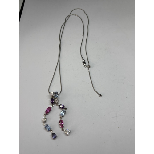 525 - A MARKED SILVER AND COLOURED STONE NECKLACE IN A PRESENTATION BOX