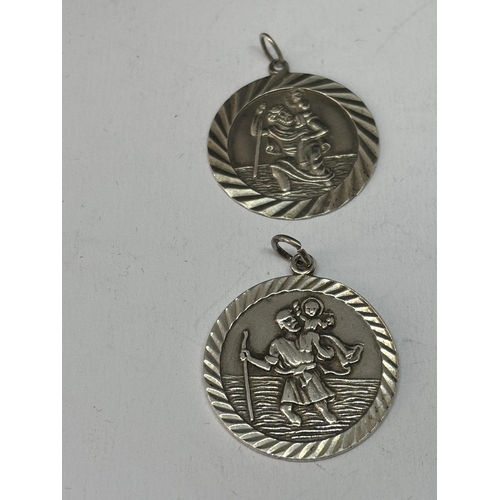 527 - FIVE MARKED SILVER RELIGIOUS PENDANTS