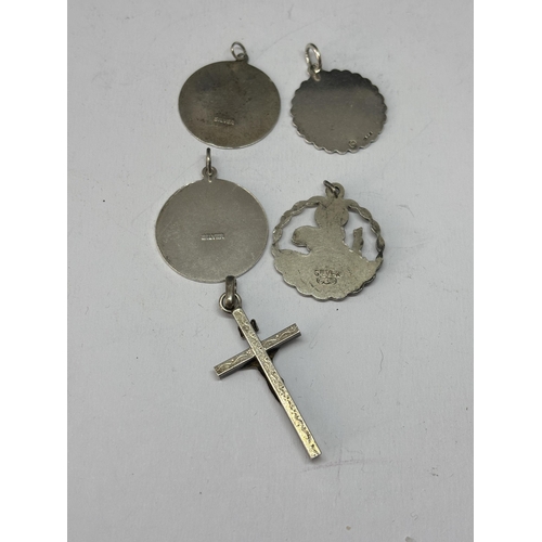 527 - FIVE MARKED SILVER RELIGIOUS PENDANTS