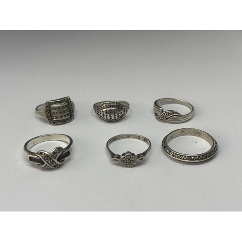 535 - SIX VARIOUS MARKED SILVER RINGS