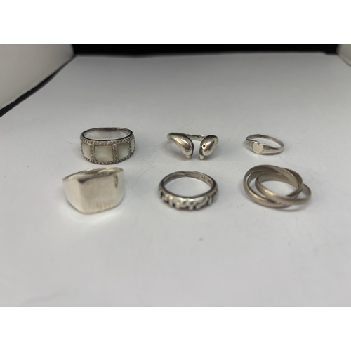 542 - SIX VARIOUS MARKED SILVER RINGS