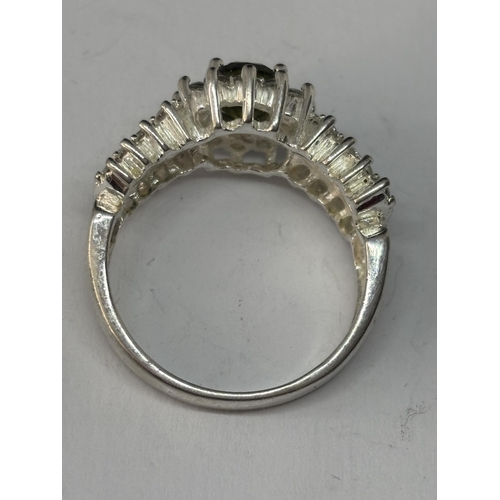 543 - A MARKED SILVER LADIES DRESS RING