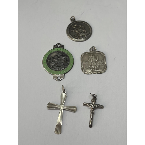 552 - FIVE VARIOUS MARKED SILVER RELIGIOUS PENDANTS