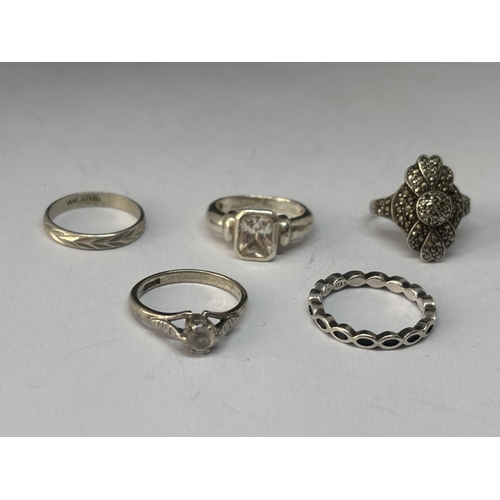 559 - FIVE VARIOUS MARKED SILVER RINGS