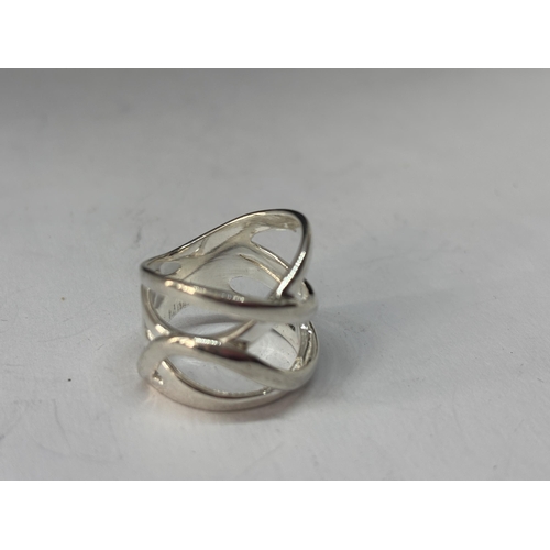 567 - A MARKED SILVER LADIES DRESS RING