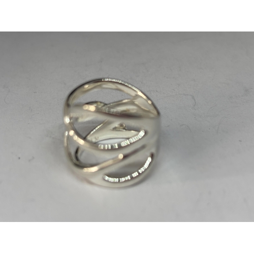 567 - A MARKED SILVER LADIES DRESS RING