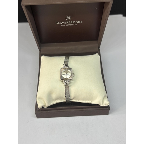 571 - A LADIES BULOVA 10 CARAT WHITE GOLD PLATED WRIST WATCH IN A PRESENTATION BOX SEEN WORKING BUT NO WAR... 