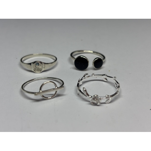 579 - FOUR MARKED SILVER RINGS