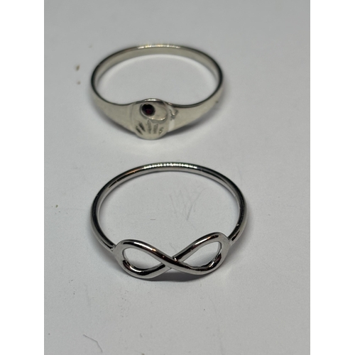 581 - FOUR MARKED SILVER RINGS