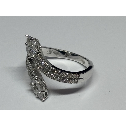 583 - AN 18 CARAT WHITE GOLD RING WITH TWO MARQUISE CUT NATURAL DIAMONDS AND THIRTY SIX ROUND BRILLIANT CU... 